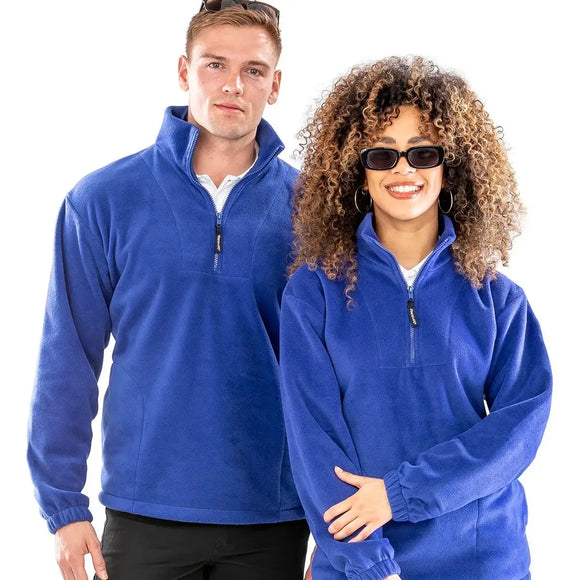 Two people wearing Result Polartherm 1/4-zip fleece - R33 in royal blue against a white background