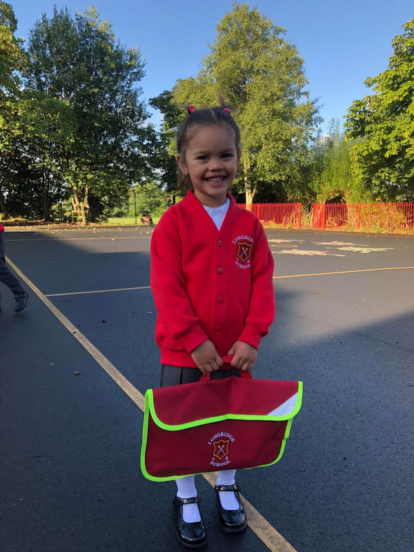 My daugther's first day of school in the Longridge C of E Primary School uniform by Ribble Apparel
