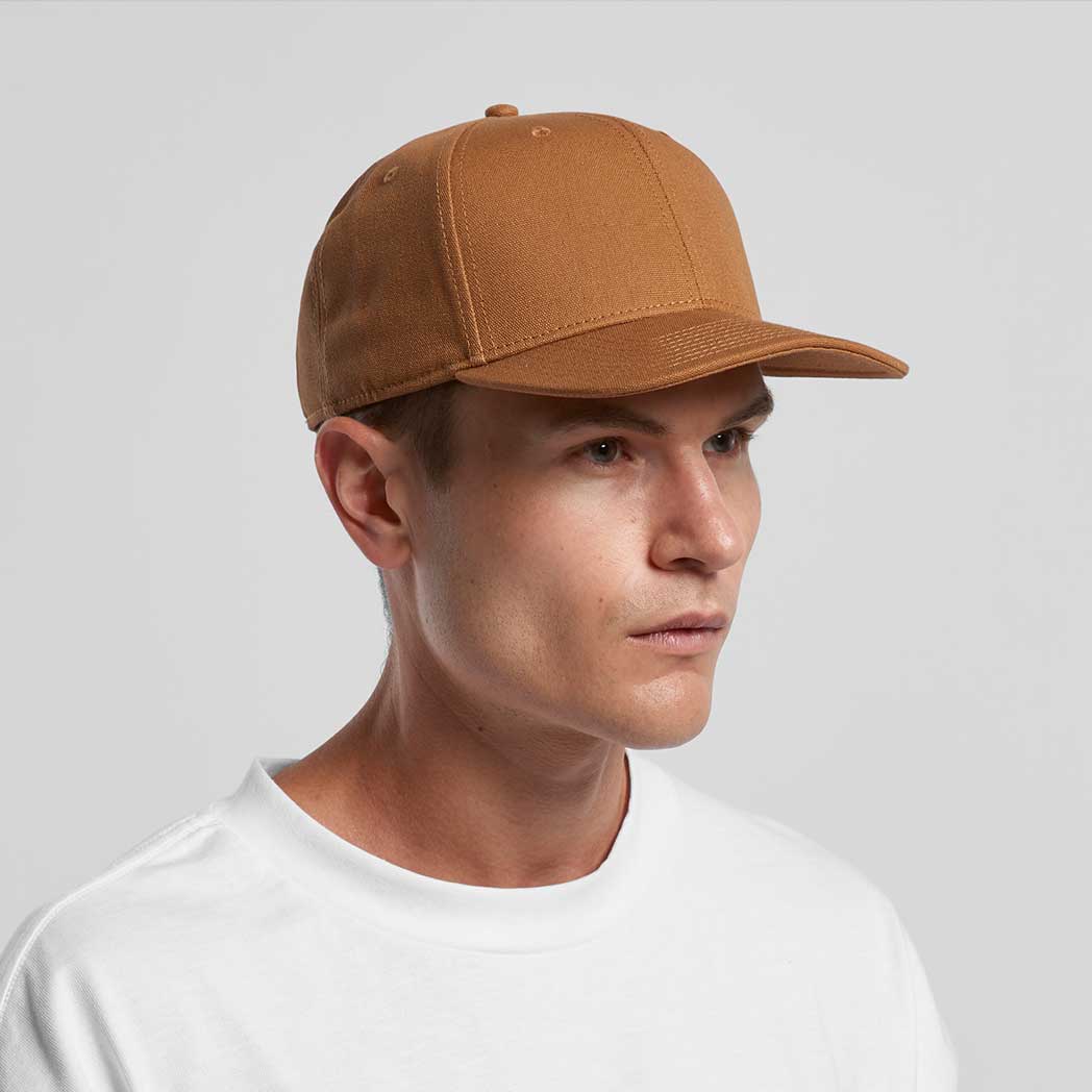 Man wearing a brown cap on a gray background