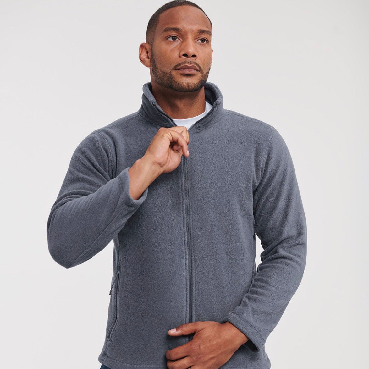 Man wearing a Convoy grey fleece jacket on a white background. Russell Full-Zip Outdoor Fleece - 870M