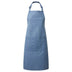 A blue denim bib apron with a center pocket, adjustable neck strap, displayed against a white background. Denim Bib Apron with Pocket - PR154