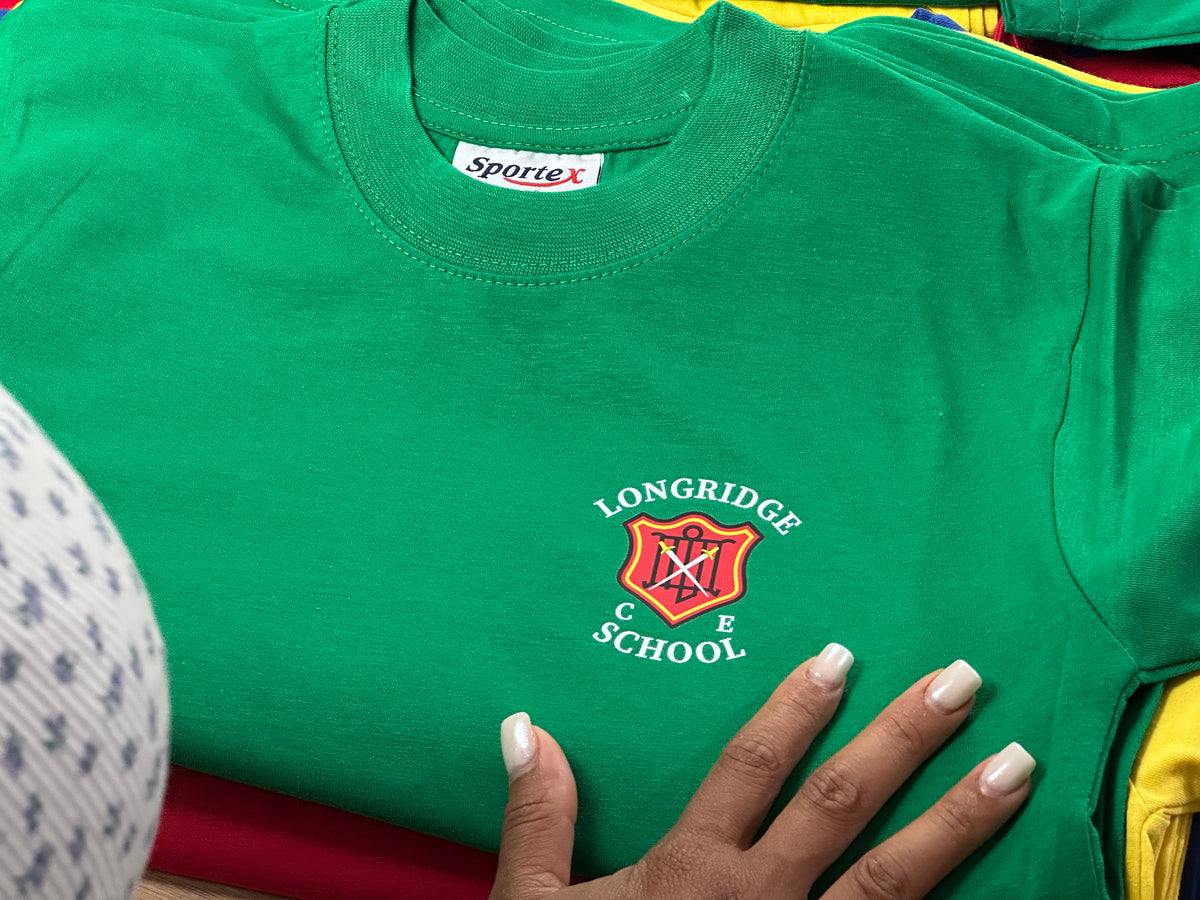 Smoothing out the finished sweatshirts