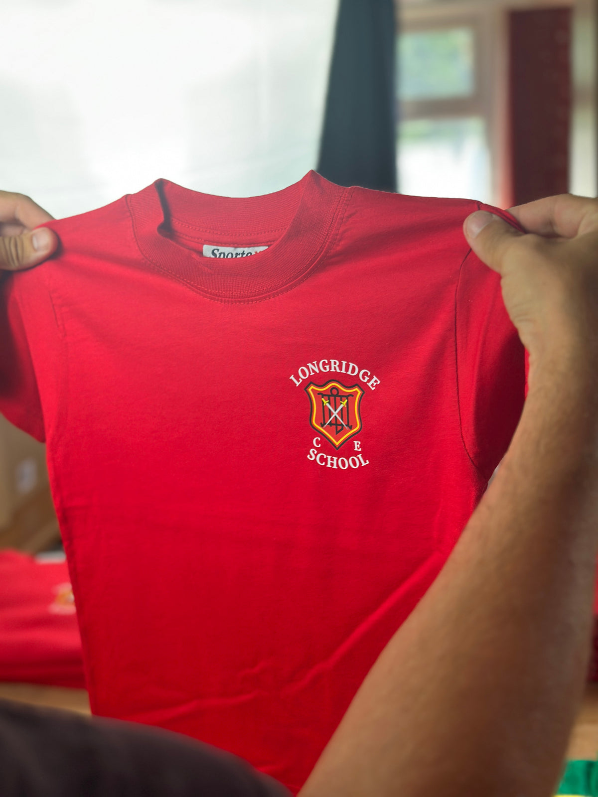 A finished school PE T-shirt