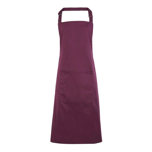 An aubergine purple bib apron with a neck strap and front pocket, displayed on a plain background. Colours Bib Apron with Pocket - PR154