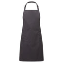 A charcoal grey bib apron with a neck strap and front pocket, displayed on a plain background. Colours Bib Apron with Pocket - PR154
