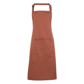 A chestnut brown bib apron with a neck strap and front pocket, displayed on a plain background. Colours Bib Apron with Pocket - PR154