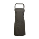 A dark grey bib apron with a neck strap and front pocket, displayed on a plain background. Colours Bib Apron with Pocket - PR154