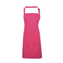 A hot pink bib apron with a neck strap and front pocket, displayed on a plain background. Colours Bib Apron with Pocket - PR154