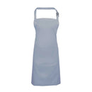 A light blue bib apron with a neck strap and front pocket, displayed on a plain background. Colours Bib Apron with Pocket - PR154
