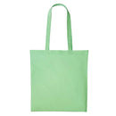 A pastel green long handle tote bag made of cotton, displayed against a white background. Nutshell Cotton Shopper - RL100