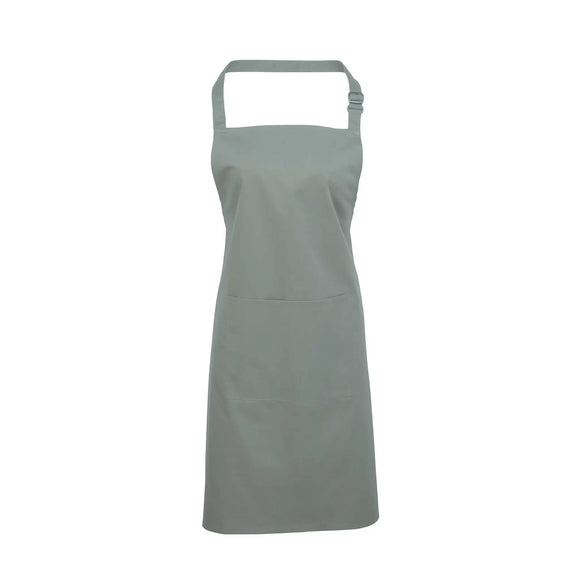 A sage green bib apron with a neck strap and front pocket, displayed on a plain background. Colours Bib Apron with Pocket - PR154