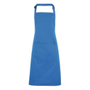 A sapphire blue bib apron with a neck strap and front pocket, displayed on a plain background. Colours Bib Apron with Pocket - PR154