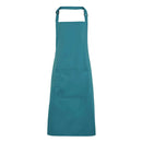 A teal blue bib apron with a neck strap and front pocket, displayed on a plain background. Colours Bib Apron with Pocket - PR154