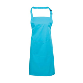 A turquoise blue bib apron with a neck strap and front pocket, displayed on a plain background. Colours Bib Apron with Pocket - PR154