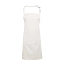 A white bib apron with a neck strap and front pocket, displayed on a plain background. Colours Bib Apron with Pocket - PR154